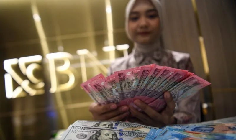 Pelemahan Rupiah Tertahan Dampak Revisi Prospek Pertumbuhan Ekonomi RI