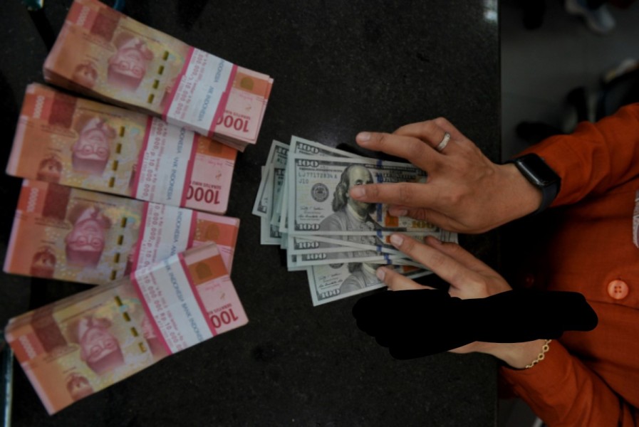 Rupiah Menguat Tipis, Perlambatan Ekonomi dan Tarif AS Jadi Pemicunya