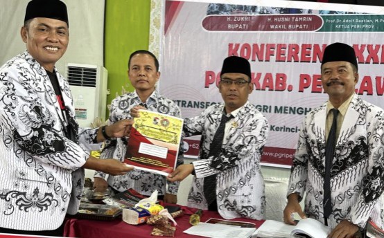 Terpilih Aklamasi, Plt Kadisdikbud Leo Kembali Pimpin PGRI Pelalawan