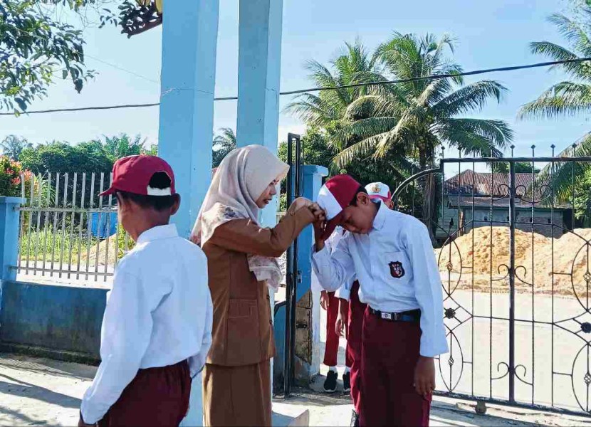 Terkait Isu Guru di Rohil Tak Mengajar, Neneng Gustiana: Penempatan Saya di SDN 006 Sungai Majo